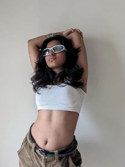 A behind the scenes photo from the "Phoenix" shoot. This was taken right before the song was released, building up the anticipation.