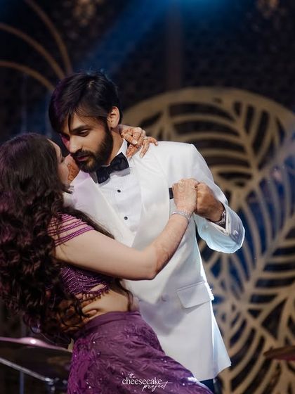 An intimate moment during their Sangeet dance, full of romance and connection.