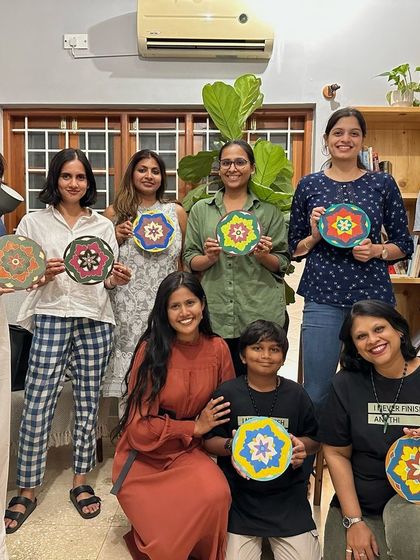 The proud artists from our Mandala workshop showing off their beautiful creations. It’s wonderful to see everyone’s unique style come to life.