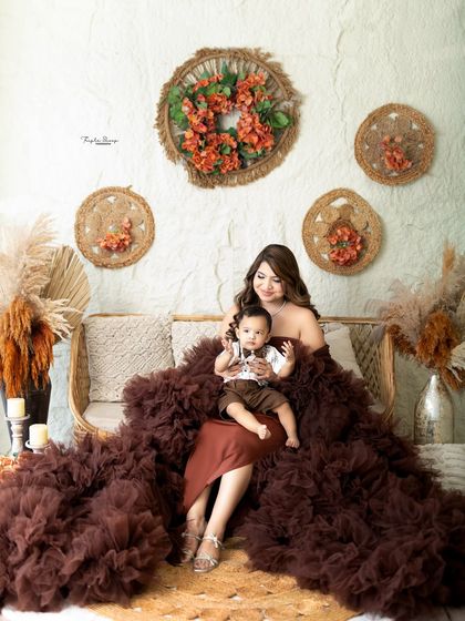 A mother and son portrait in my boho studio. The rich brown tones of the dress and decor create a warm, earthy, and cohesive look.