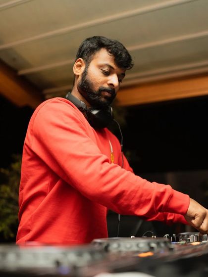 A close-up of me at the decks, concentrating on the music.