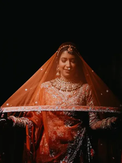 There is a timeless beauty in a bride behind her veil. This portrait is all about capturing that quiet grace and anticipation. Using soft light, we create classic bridal shots that you will cherish forever.