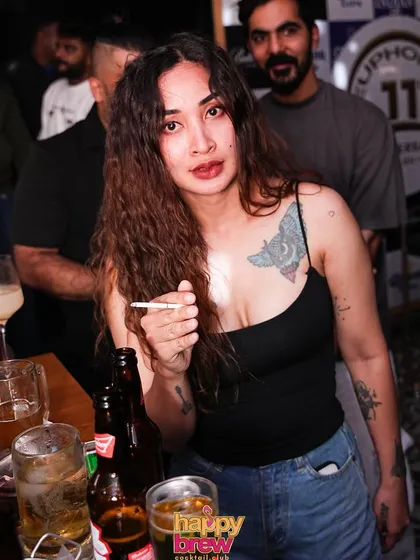 A guest enjoying a drink at the anniversary bash. The party went on from 1 pm to 1 am.