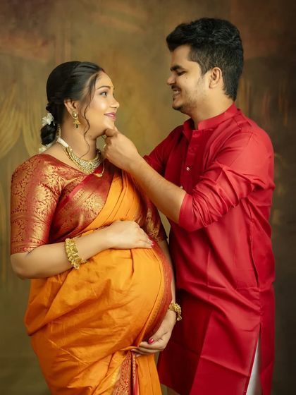 A playful and affectionate moment during your traditional maternity shoot. These candid interactions are what make your photo session a truly memorable experience.