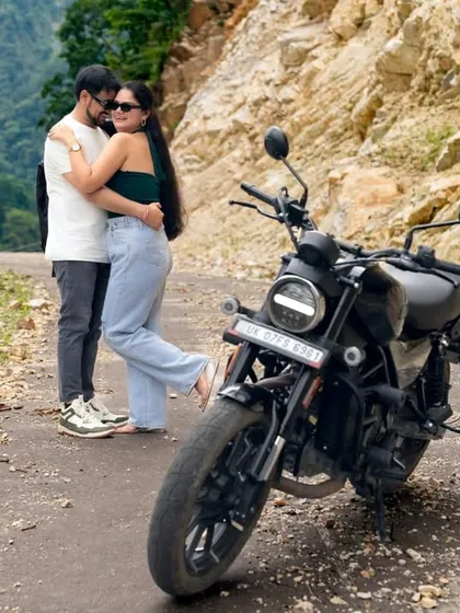 A sweet embrace on the side of a mountain road. This candid moment shows the love and connection between the couple amidst the rugged beauty of nature.