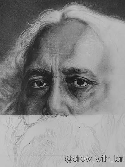 A close-up of the Tagore WIP. You can see the detailed rendering of the eyes and forehead, contrasting with the untouched lower half of the drawing. This shows the patience required for realism.
