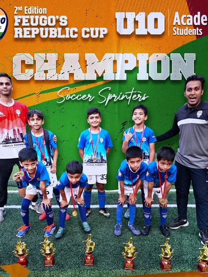 The 'Soccer Sprinters', our U-10 Champions at the Republic Day Cup, posing with their coaches.