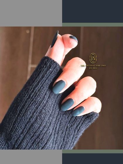 Cozy sweater weather calls for moody nails. This matte dark teal set is chic, bold, and effortlessly classy.