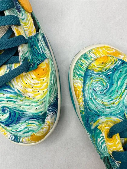 A top-down macro shot of the "Starry Night" custom, showing the detail on both shoes.