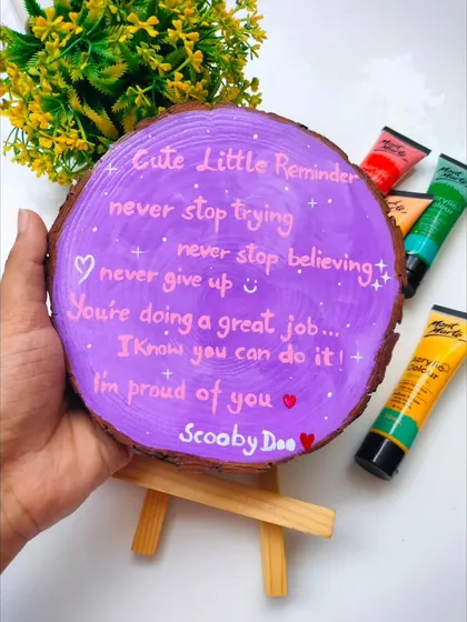 The back of the "cute potato" wooden log, featuring a hand-painted "Cute Little Reminder" to keep you motivated. It's a small piece of art with a big heart.
