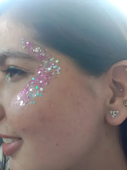Sometimes, all you need is glitter. This is my signature chunky glitter application, perfect for creating a bold festival or party look. I mix different sizes and colors of glitter to create a custom, high-impact effect that looks amazing in photos.