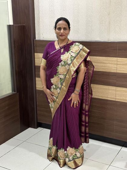 How lovely our client looks in the pure Mysore crepe with embroidery and cutwork silk saree. The rich purple color suits her so well.