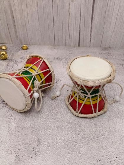 A pair of handcrafted temple damroos, associated with Lord Shiva. A unique decorative and ritual item.
