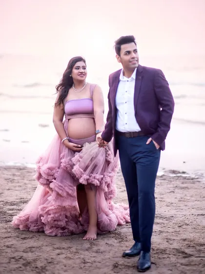 Walking hand-in-hand along the shore, looking towards the future. The flowing gown adds a beautiful sense of movement and drama.