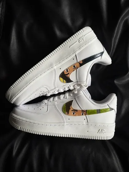 A top-down view of the Ghibli custom sneakers, showcasing the minimalist yet charming design.