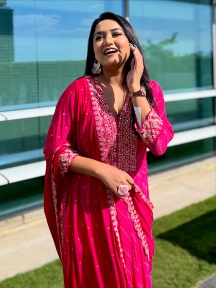 A bright and happy moment in this beautiful pink embroidered suit. This look is perfect for hosting daytime events, festive gatherings, or even a Roka ceremony.