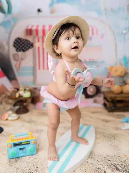 A moment of balance and concentration on the mini surfboard.