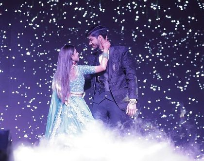 A romantic moment from a couple's first dance, complete with a starry background and smoke effects. We help create a truly magical setting.
