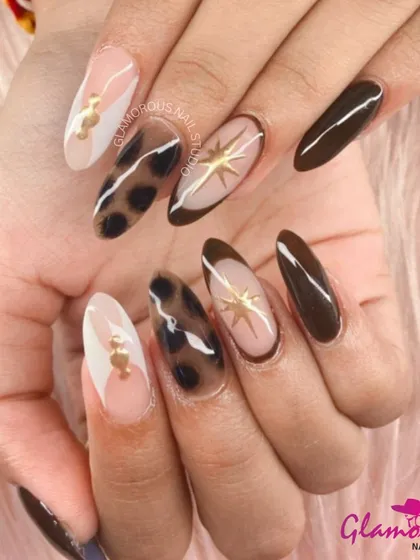 A fierce and fashionable combination. This set features bold leopard print, solid chocolate brown, and celestial starbursts, all tied together with gold accents. It's a perfect example of a maximalist, trendy design.