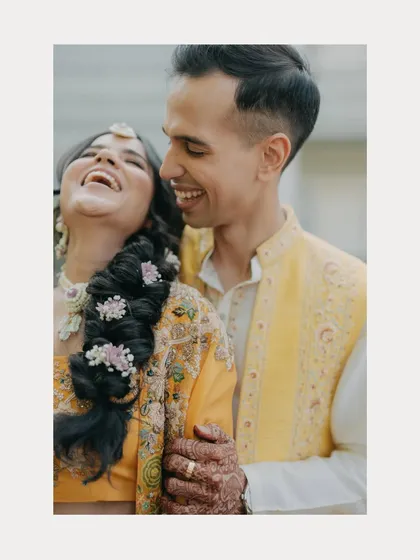 A Haldi ceremony is about pure, uninhibited joy. We capture the vibrant colors and infectious laughter of these moments, focusing on the genuine happiness shared between the couple and their loved ones.
