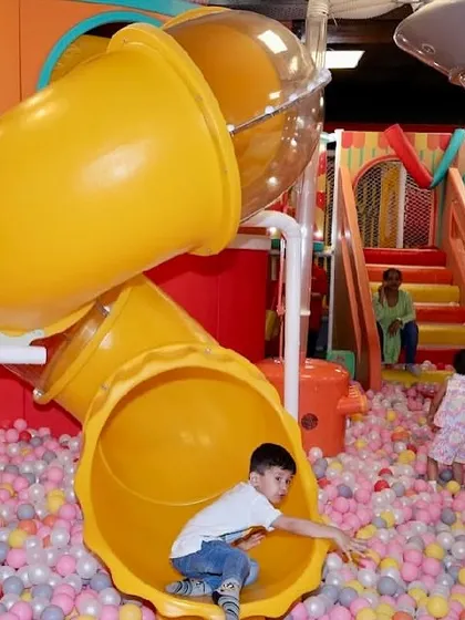 The centerpiece of our play area is the multi-level soft play structure, complete with a winding slide that ends in a massive ball pit. It’s a world of non-stop fun and adventure for energetic kids.