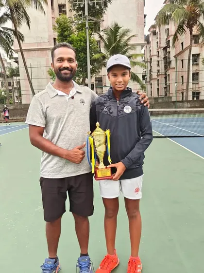 A proud coach with Tamanna Nair celebrating her National Series doubles win.