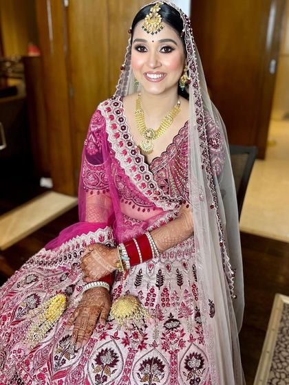 My gorgeous bride Surbhi, all smiles on her wedding day. We went for a classic look that made her feel beautiful and confident.