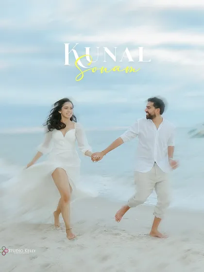 A playful and romantic shot of the couple running along a beautiful beach in Thailand. The motion in the image captures their joyful energy and the carefree spirit of a destination shoot.