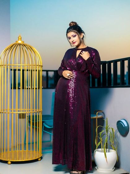 A confident pose that captures the essence of this glamorous fashion shoot, with the makeup designed to stand out.