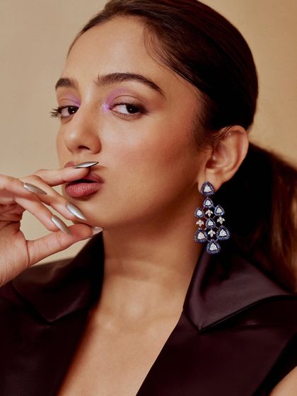 Custom silver chrome press-on nails designed for Ahsaas Channa. The sharp, metallic finish gives a futuristic and bold edge to her look.