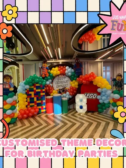 Building a world of fun with a Lego-themed birthday party. This setup uses bright, primary-colored balloons and Lego block designs to create an imaginative and playful atmosphere for little builders.