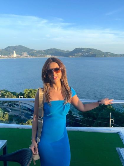 Enjoying the incredible view in Thailand. A simple, well-fitted dress in a bold color always makes a statement.