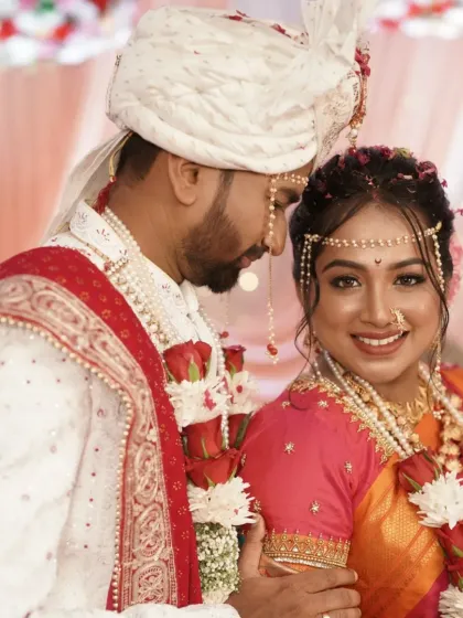 A beautiful couple portrait from the wedding ceremony, their traditional outfits perfectly coordinated.