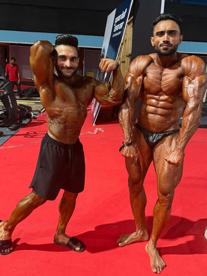 Another shot with a fellow champion. The camaraderie backstage is as important as the competition on stage.