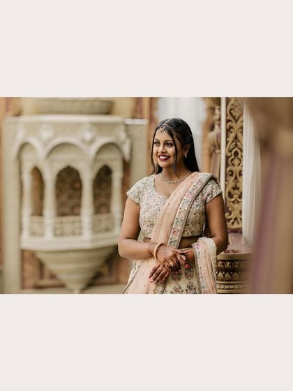 A lovely candid portrait of the bride, her happy expression captured beautifully.
