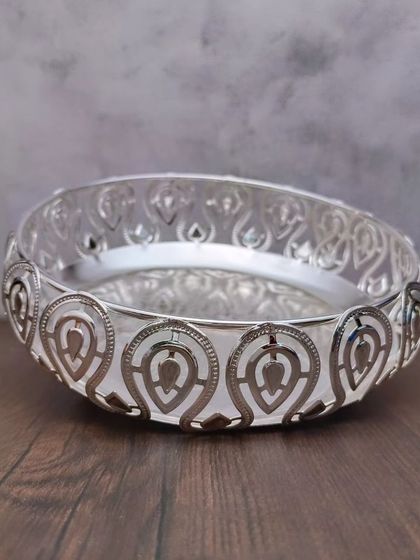 Another angle of the leaf designer tray, showing how the light catches the intricate cuts in the border.