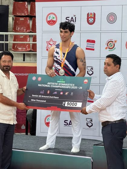 Recognizing excellence. Our senior all-around champion receiving his prize at the National Championships, a proud achievement for him and the entire academy.