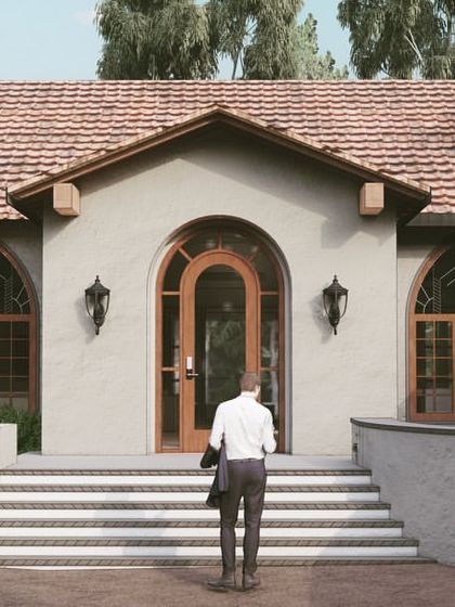 A close-up render of the entrance to "The Abbey House," showcasing the arched windows and doorways that evoke a sense of history and timelessness.
