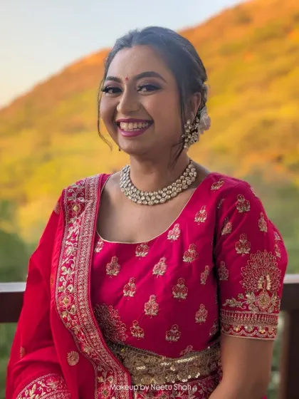 Another shot of this happy client, showcasing how the makeup looks beautiful and natural even with a big smile.