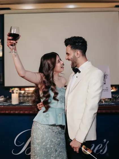Capturing the vibrant energy of a pre-wedding cocktail party. This candid shot is all about the laughter and celebration, showing how I document the authentic, happy moments you share with each other before the big day.
