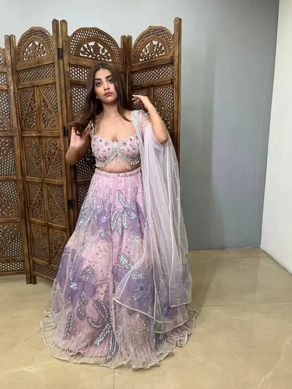 The full look of this ombre lehenga, showing its unique color gradient and flowy silhouette.