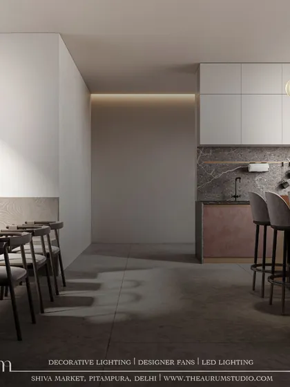 A modern pendant with two offset glass globes adds a sculptural, artistic touch. This design redefines elegance in every detail, providing both light and a conversation piece.