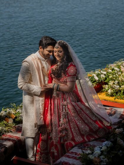 An intimate portrait of the couple. The bride's soft hairstyle complements the romantic and natural setting of their destination wedding.