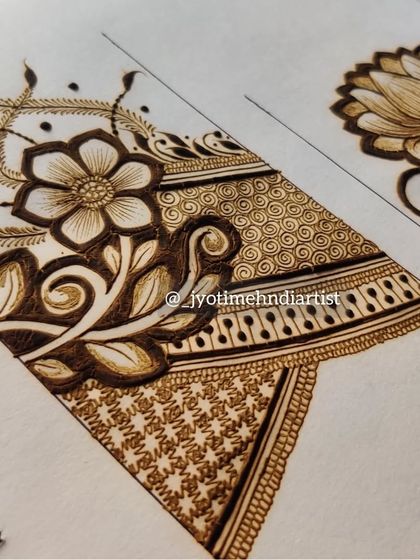 A close-up of a floral vine startup design, focusing on the detail of the petals and leaves.