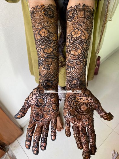 A classic full bridal design with a focus on roses and intricate fill patterns, perfect for a traditional bride.