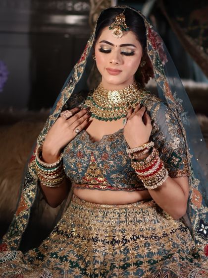 A close-up of the bride's gentle expression, with the makeup looking soft and flawless.