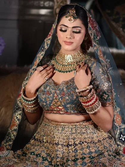 A close-up of the bride's gentle expression, with the makeup looking soft and flawless.