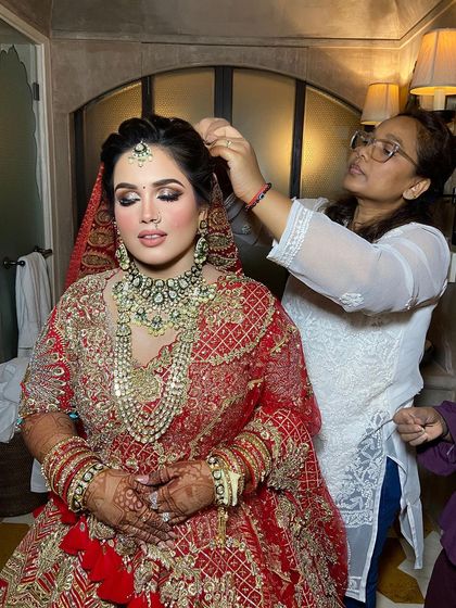 A serene moment before the bride is fully ready. The makeup is complete, and she already looks absolutely stunning.