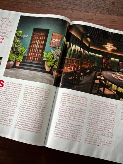 A magazine spread featuring our design for Otra. The article describes the space as a "Latin American speakeasy," capturing the moody, exclusive atmosphere we aimed to create with the dark tones and dramatic lighting.