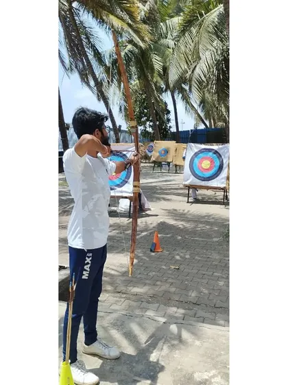 This student is building his skills, focusing on consistency with every shot.